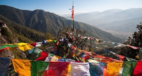 Prayer flags at the top of a mountain in Bhutan